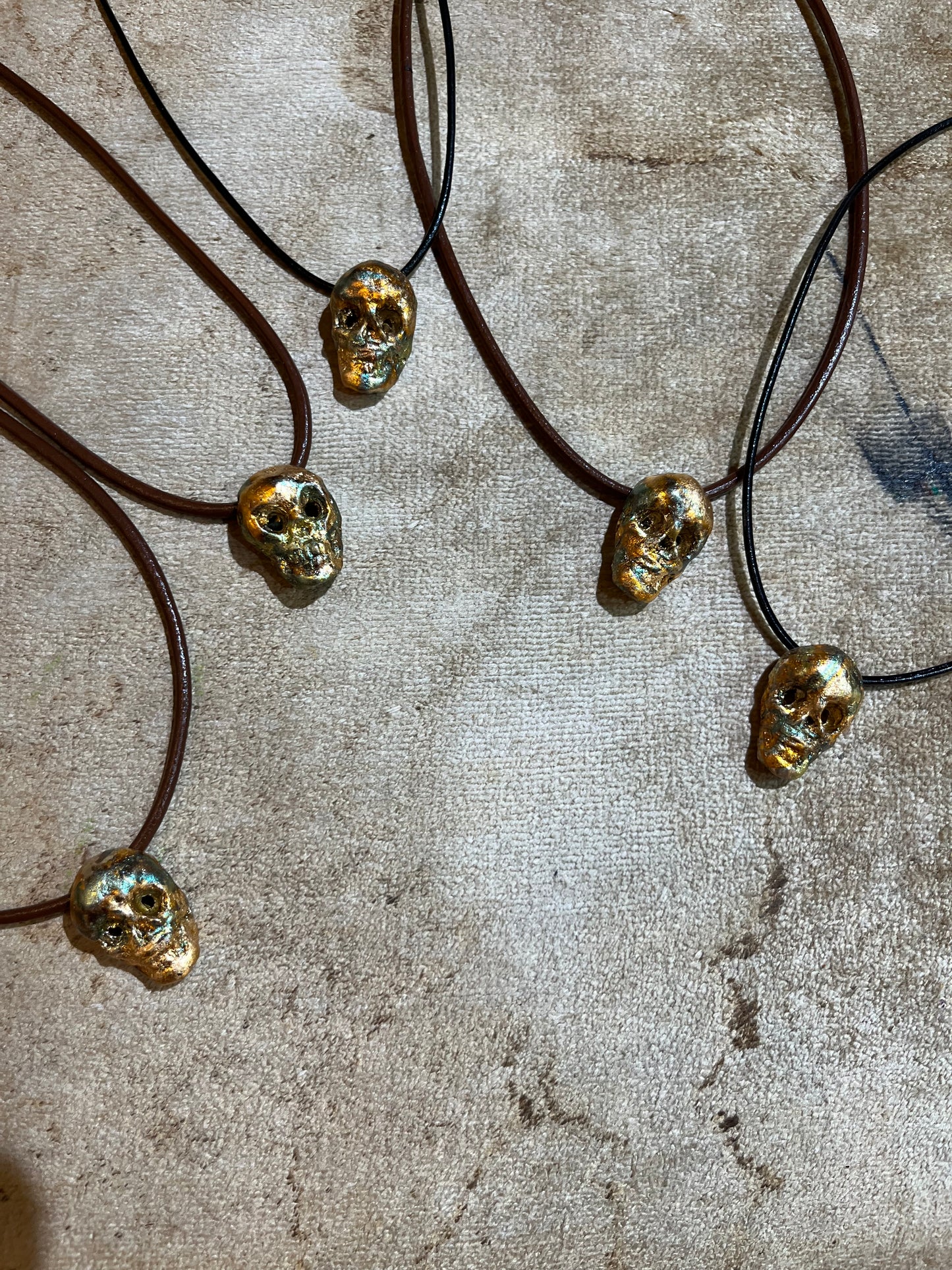 BRONZE/GOLD LEAF SKULLS