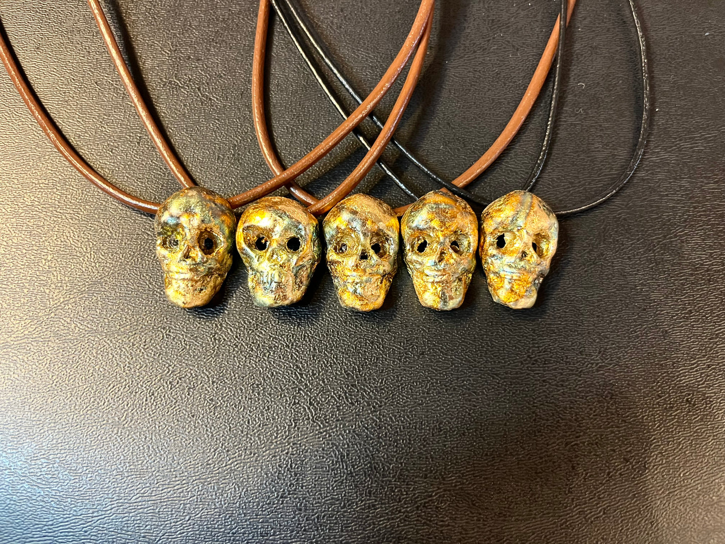BRONZE/GOLD LEAF SKULLS