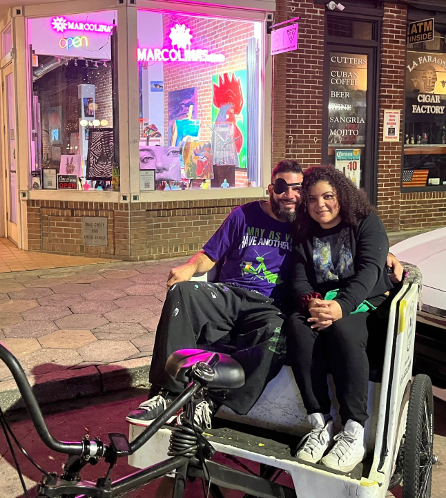 Contemporary expressionist painter Guillo Perez III and wife Marcolina Mercado, outside their Tampa based art gallery.